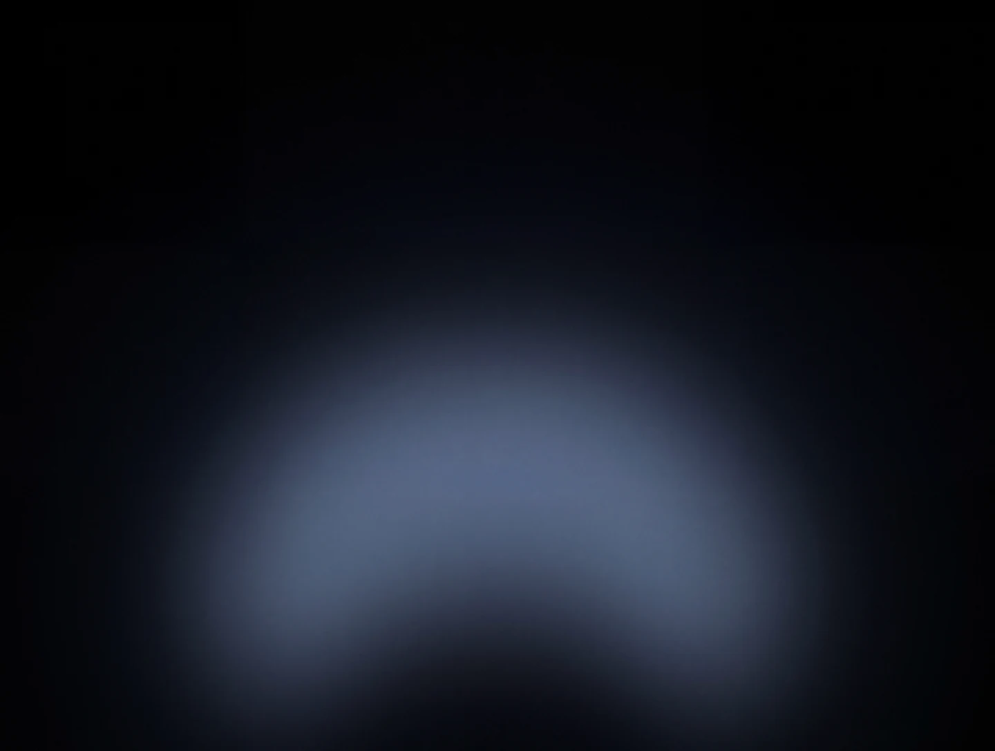 AMOLED & Dark wallpaper fitted to the Galaxy Z Fold 8 main display — a soft slate-blue glow low in the frame, fading into black above
