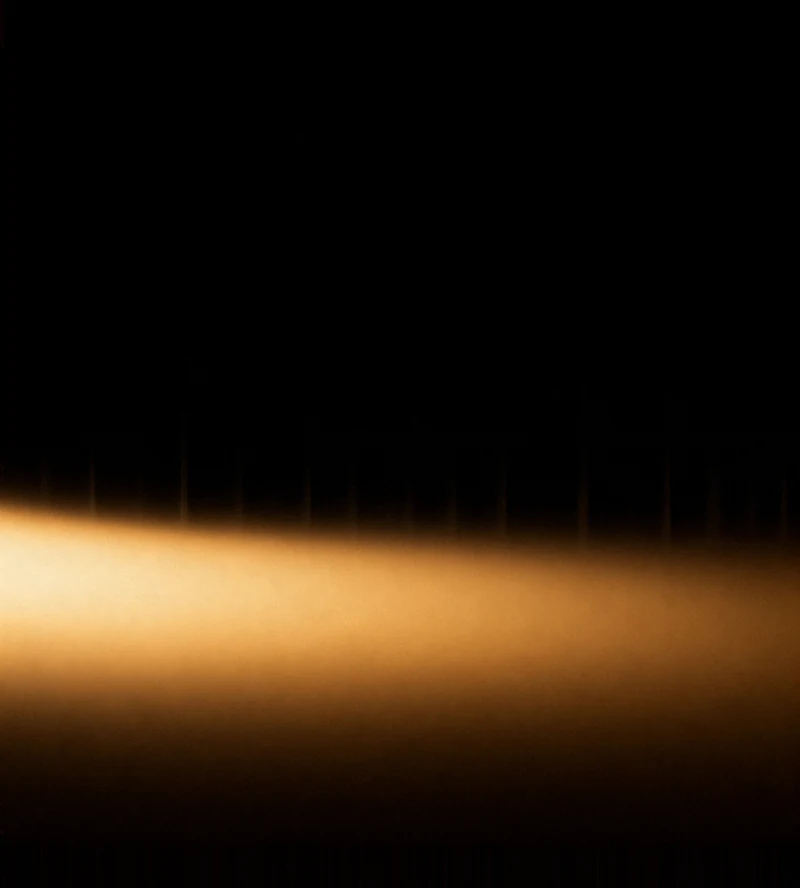 AMOLED & Dark wallpaper fitted to the Galaxy Z Fold 8 Ultra inner display — a low amber-gold haze pooled near the bottom, brightest left of centre
