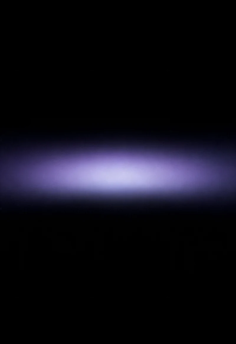 AMOLED & Dark wallpaper fitted to the iPhone Duo outer display — a diffuse violet fog glowing softly mid-frame on deep black, sinking into black around it