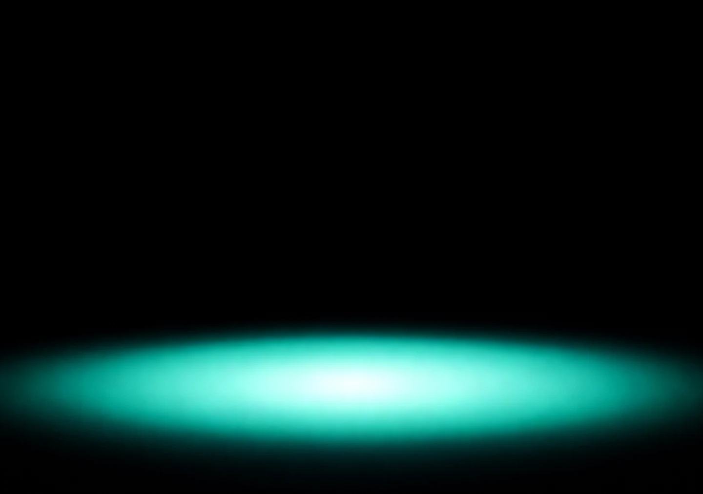 AMOLED & Dark wallpaper fitted to the iPhone Duo inner display — a soft mint halo of light glowing low on deep black, wrapped in dark space